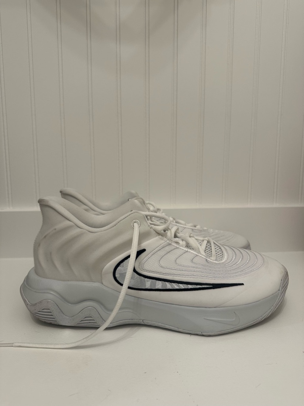 Nike White High-Top Trainers with Black Swoosh Accent